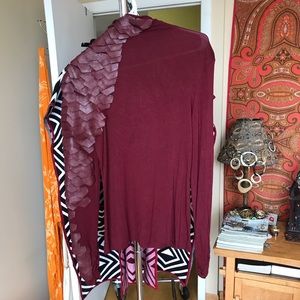 2 for 1 turtlenecks w/ leather arm embellishment.